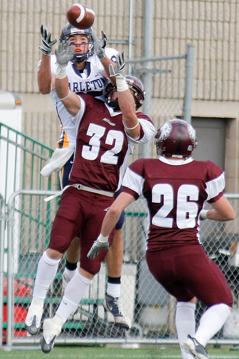 Augsburg defense back John Hibbs breaks up a Vaugn Schmid pass intended for 	Anthony Kemper during a game between Augsburg College and Carleton College on October 10, 2009 in Minneapolis, Minn. Augsburg won 31-28. 