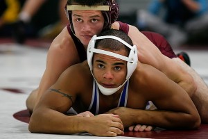 Jayson Ness pins Malik Stewart at 2:03