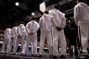 The Augsburg College Wrestling team listens to the National Anthem before Session II of the NCAA Div. III Wrestling National Championships in Cedar Rapids, Iowa on March 5, 2010. Augsburg won their 11th team title the next day.