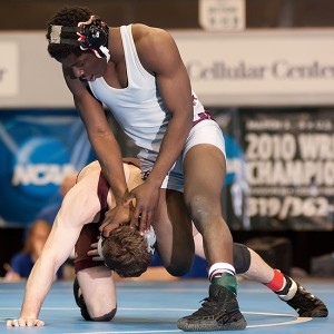 Action between Paul Bjorkstrand (Augsburg) and Bebeto Yewah (Wisconsin-La Crosse) in the 133 pound final of the 2010 NCAA Division III Wrestling National Championships in Cedar Rapids, Iowa on March 6. Yewah won the match 14-9. Augsburg won the team title for the 11th time in 20 years.