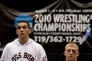 Augsburg's Orlando Ponce looks serious after his second place finish at the 2010 Division III Wrestling National Championships in Cedar Rapids, Iowa on March 6, 2010. Also seen is Coe's Chris LeClere, who finished fourth. The seventh seeded Ponce defeated the third-seeded LeClere 11-9 in the semifinals. Ponce also defeated second-seeded Carrington Banks 3-2 in the quarterfinals.