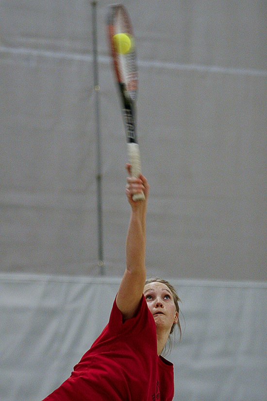 ST. PAUL, MINN. -- An unidentified Martin Luther women's tennis player serves the ball during a 1. Singles match with Katelyn Glenna of Macalester on Jan. 28, 2012 in St. Paul, Minn. Macalester won 8 matches to 1.