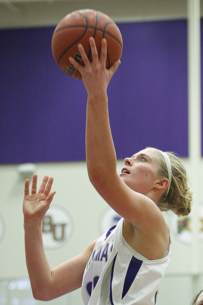 ST. PAUL, MINN. -- St. Thomas freshman Anna Smith takes a shot in the second half of a 93-52 victory over St. Catherine University on Feb. 8, 2012 in St. Thomas' Shoenecker Arena. Smith scored a game-high 11 points off the bench to lead the No. 15 Tommies to their twenty-first straight victory and a share of the MIAC conference championship.