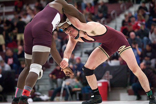Sebastian Gardner (Concordia-Moorhead) ties up with Tyrell Martin (Augsburg) during their 174 pound first-place match at the 2015 NCAA Div. III Wrestling West Regional on Feb. 28, 2015 at Augsburg College's Si Melby Hall. Third-seeded Martin upset top-seeded Gardner 5-4 on a last-second takedown.