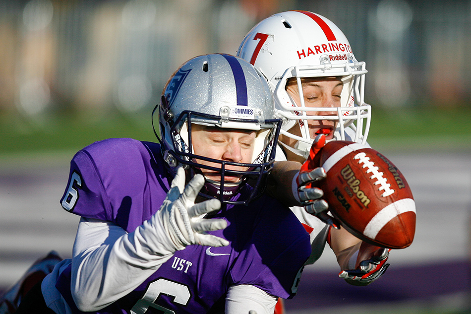 ST. PAUL, MINN. (Nov. 28, 2015) -- St. John's wide receiver Dan Harrington (7) battles St. Thomas defensive back Chris Pierson (6) for a pass during the fourth quarter of an NCAA Div. III Football second round playoff game at the University of St. Thomas in St. Paul, Minn. The No. 4 Tommies defeated their arch-rival No. 10 Johnnies 38-19. The pass was incomplete.