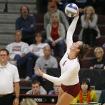 Augsburg volleyball player Colleen Ourada (6) hits the ball in the fourth set of a match between UW-Stout on September 11, 2014. Augsburg won 3-2 (25-12, 15-25, 25-18, 18-25, 15-9). Ourada had 14 kills.